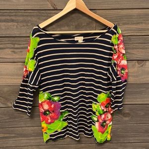 Navy and cream striped top with floral appliqués.